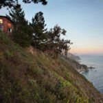 House on cliff with ocean
